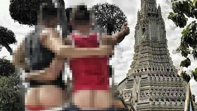 美国情侣在泰国寺院拍摄不雅照，结果被捕面临罚款或监禁