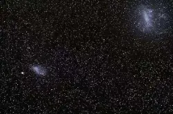 银河系附近上演一场星系大战 大麦哲伦星系正手撕同伴