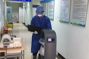 硬核抗“疫”送餐机器人加入北京世纪坛医院抗…